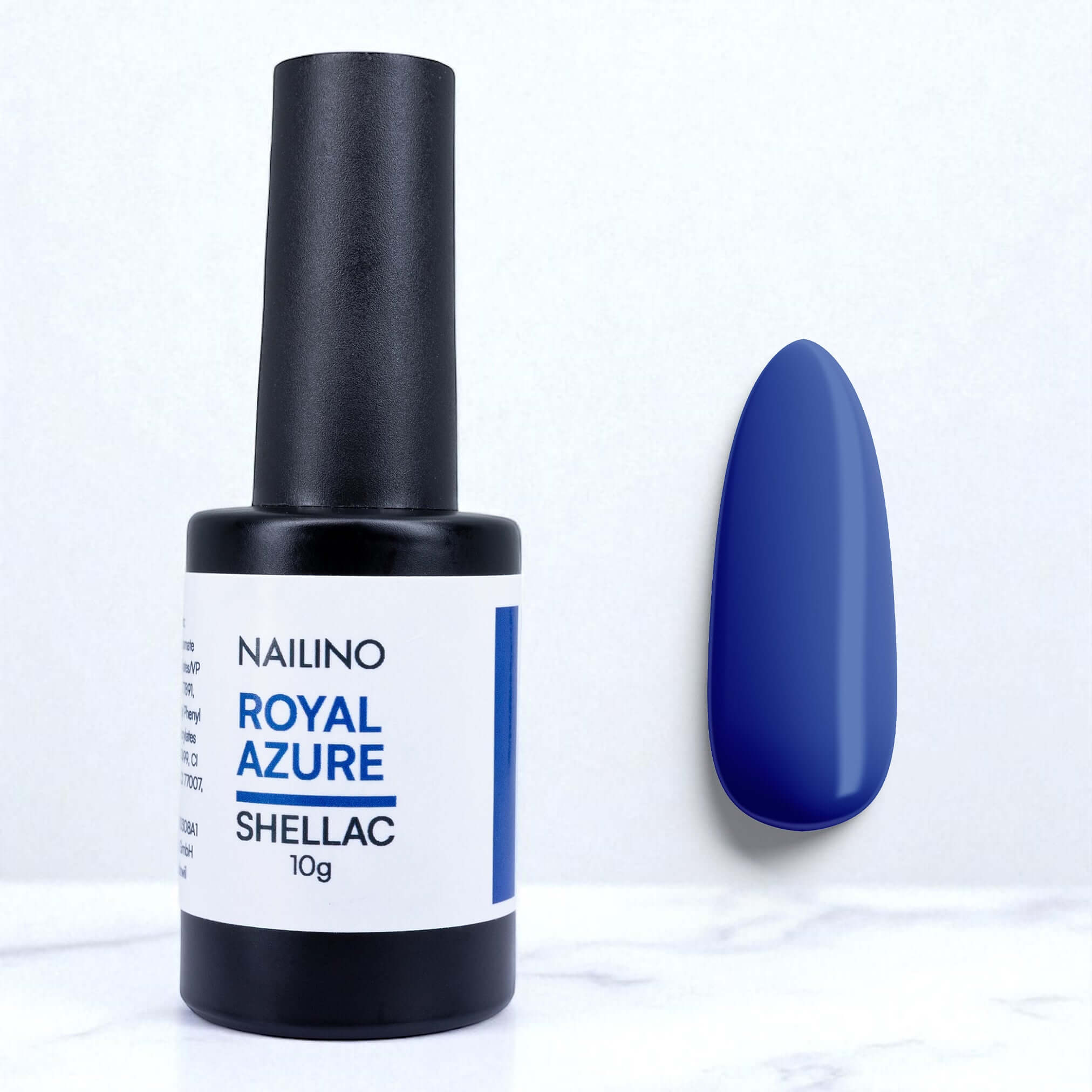 NAILINO Shellac Royal Azure bottle next to a swatch of the vibrant royal blue nail polish.