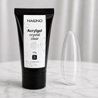 NAILINO Acrylgel Crystal Clear in schwarzer Tube auf einem Marmoruntergrund mit klarer Nagelform.