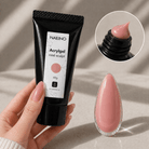 NAILINO Acrylgel Rosé Sculpt Tube mit rosa Nagellack und Hand im Bild, ideal für feminine Nageldesigns.