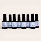 NAILINO Diamond Glow Bundle - 7 Shellac Farben in matten Flaschen auf hellen Hintergrund