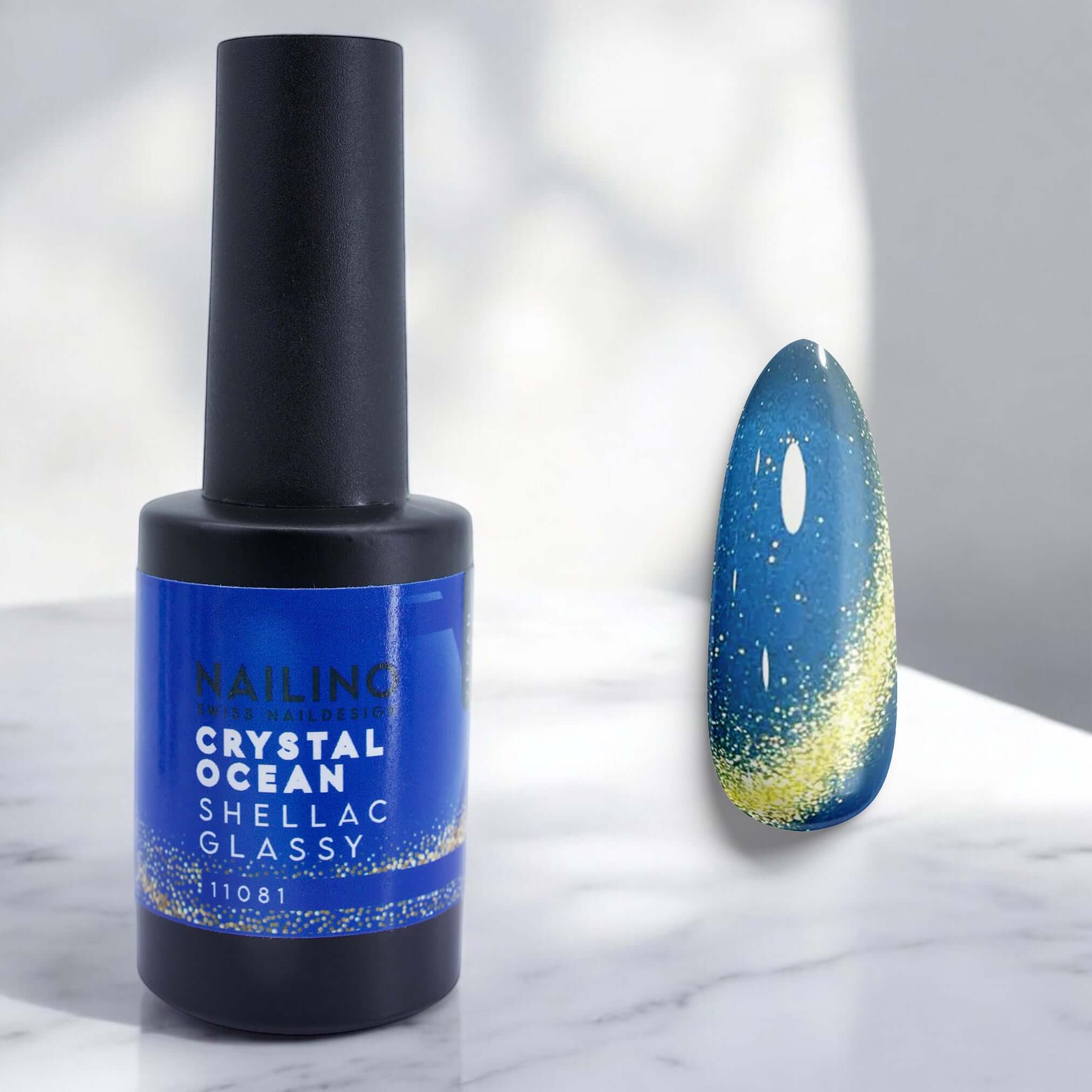 NAILINO Shellac Glassy Cat Eye Crystal Ocean&nbsp; – Tiefblau mit goldenem Glaseffekt