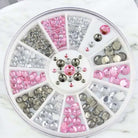 Strasssteine-Mix in Pink, Silber und Grau in runder Sortierbox für Nail Art und Nageldesign.